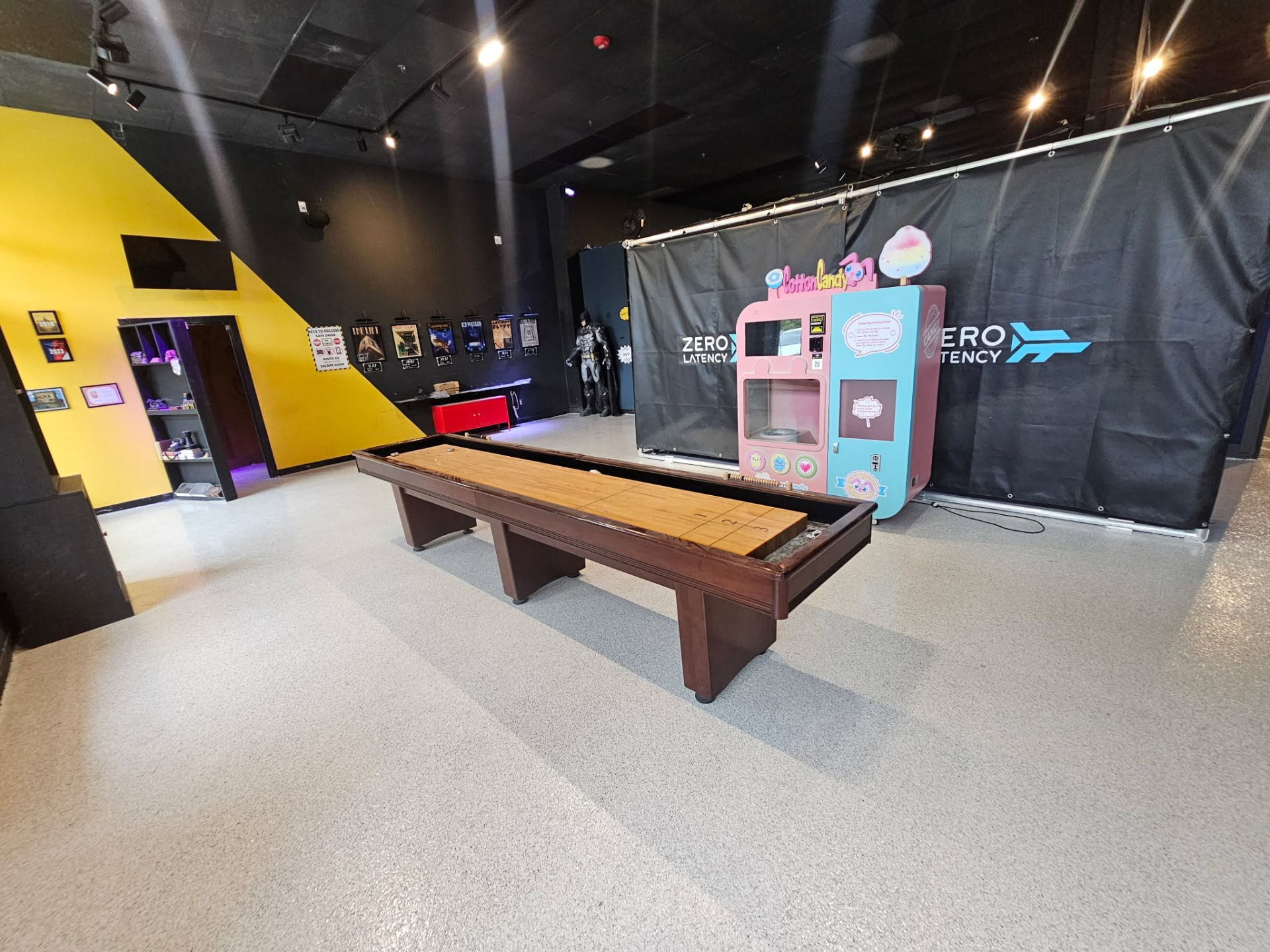 Epoxy game room floor with shuffleboard at a VR arena