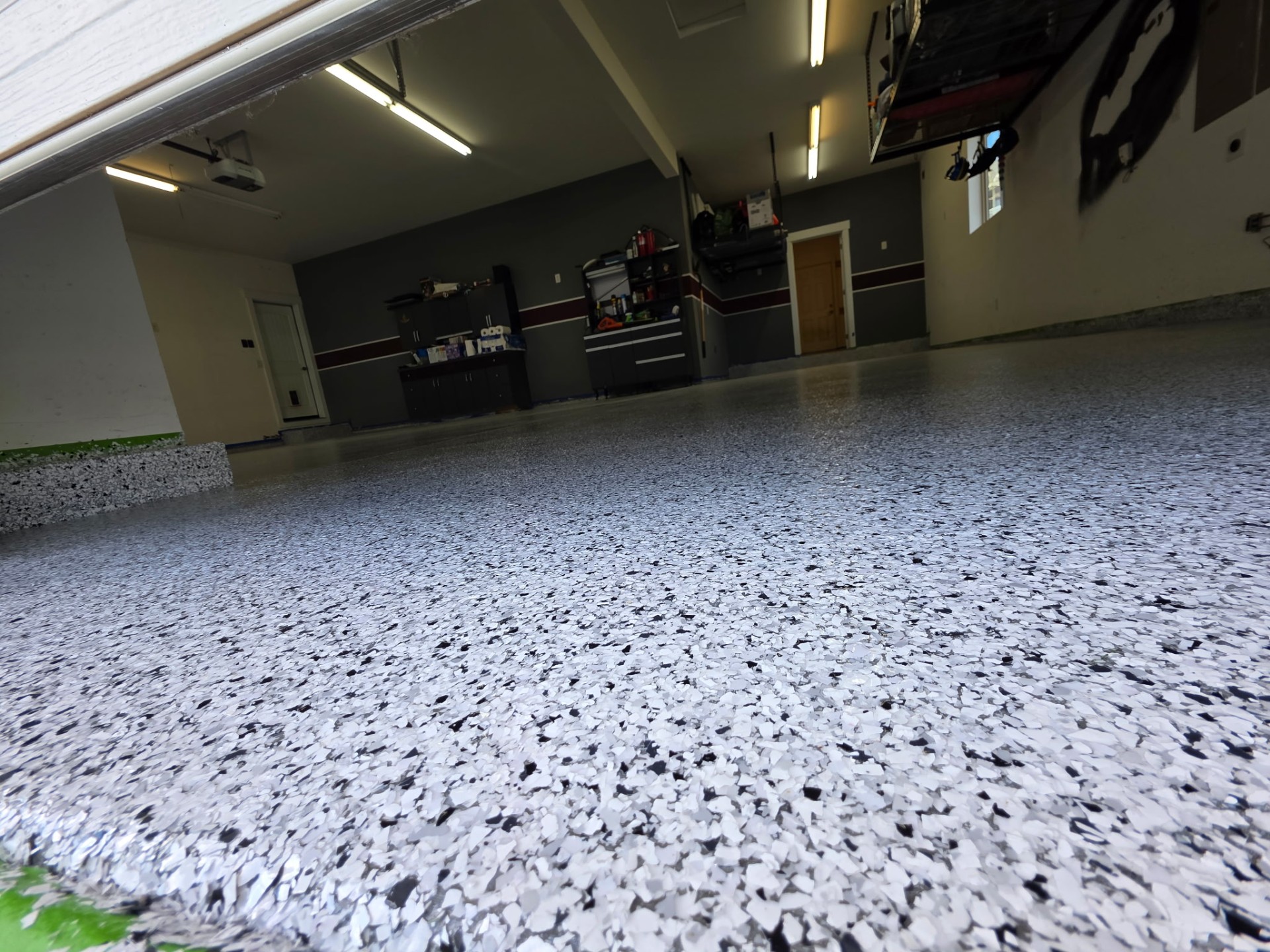 Close angle of flake epoxy garage floor